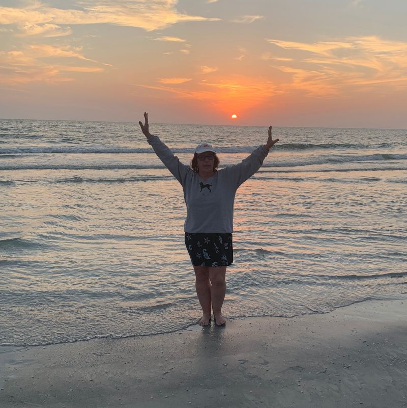 Photo of Diane on beach